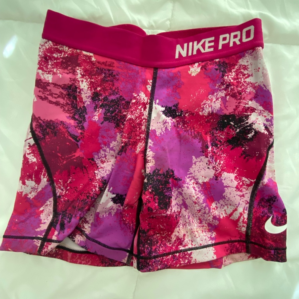 Pink paint Nike pros
